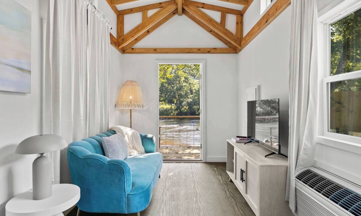 Sylva House | Breezy, Riverfront Tiny Home, King Bed, and Deck