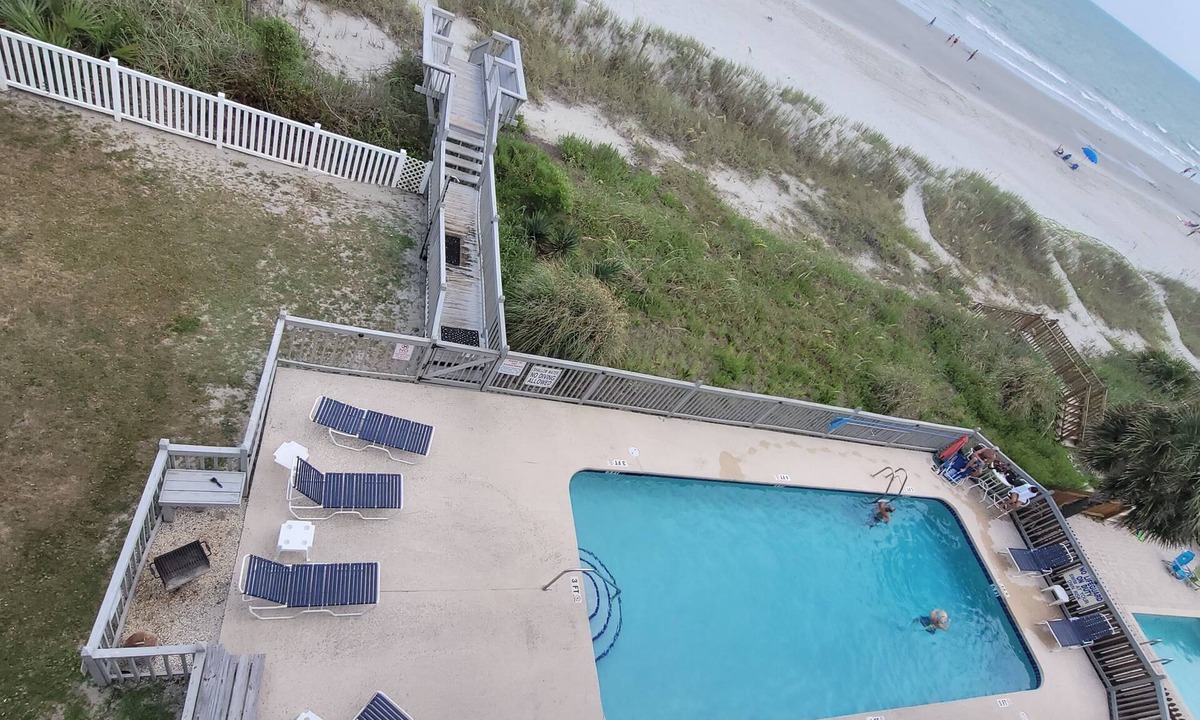 Surfside Beach Condo | Leave your worries behind in this cozy getaway right on the beach!