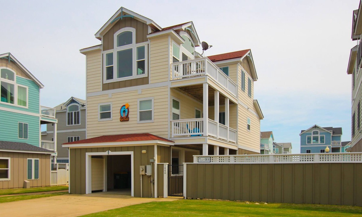 Whalehead Beach House | Oceanside home with private hot tub, central AC, fireplace, and pool access