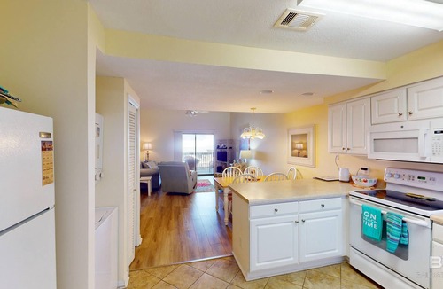 Orange Beach East Condo | A short stroll to the white sand beach of the Gulf of Mexico and Ole River.
