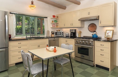 Historic Eastside House | Beautifully renovated and decorated historic adobe home and casita in country like setting on 1/3 acre. Lovely garden views. Centrally located on Santa Fe's coveted Historic East Side.