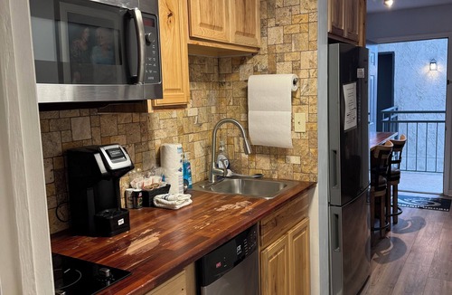Gatlinburg Condo | Clean Condo, Walk to Everything! Back Stairs Take You Right to Downtown!