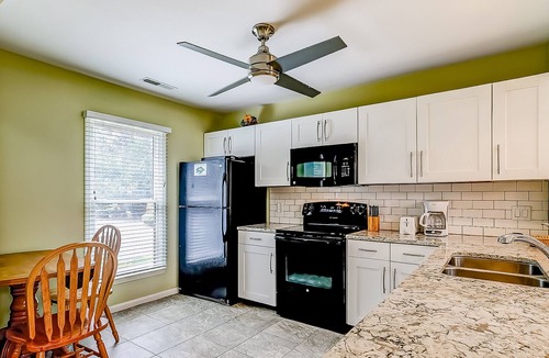 Sea Pines House | Cozy townhome with access to multiple shared amenities, bike paths, shopping