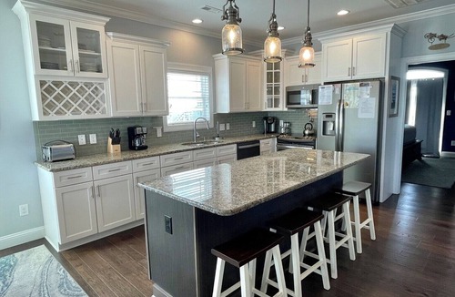 Sunset Beach House | Discover The Lazy Pelican: a spacious 5BR home in Sunset Beach, perfect for family getaways.