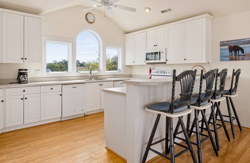 Monteray Shores House | Dog-friendly sound-front home with pool, fireplace, game room & washer/dryer