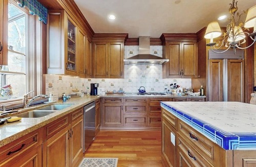 West End House | Elegant Aspen townhouse with an inviting deck, fireplace, and washer/dryer