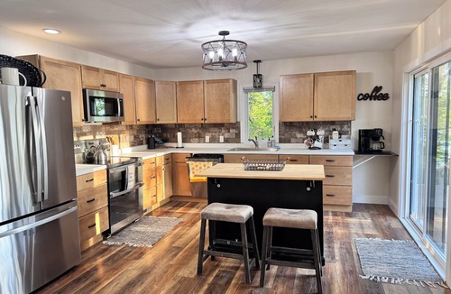 Elk River House | Enjoy beautiful sunsets year round from this spacious 3 BR home on Lake Orono.