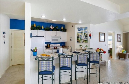 Lakeland Condo | Lake views for miles! 3 BR, 2 BA, 3rd floor condo in Harbour Towne, Lake Ozark.