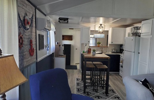 Evart Cottage | Modern cottage with dock and frontage on private lake.