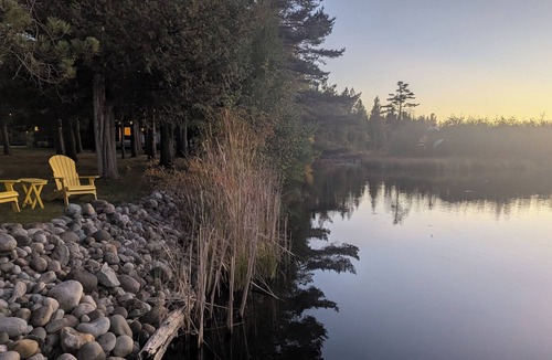 Grayling House | Modern house on the AuSable w/canoe & swimming access