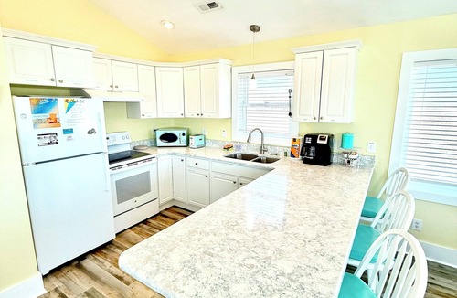 Sea Retreat House | Panoramic Ocean Views in this Updated Vintage Beach Cottage Right on the Beach!