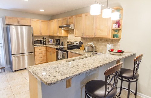 Butler Beach House | Pet-Friendly Duplex , Two Blocks from The Beach with Ocean Views