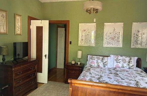 Silver Hill Apartment | Private Gated Garden Suite in Historic Home, walk to UNM Football and Basketball, UNM and Pres Hospitals