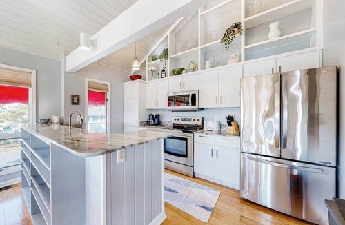 Sandpiper Pines House | Sandpiper Village home with private beach, fireplace, balcony, & washer/dryer