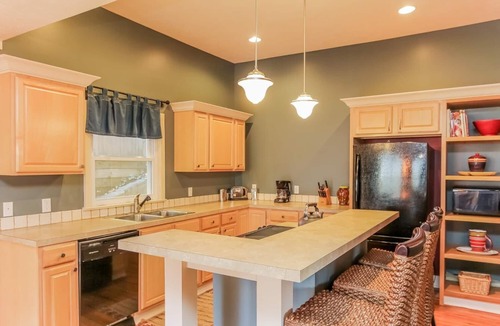 Saugatuck Villa | Screened porch pt water views hot tub walk to Saug