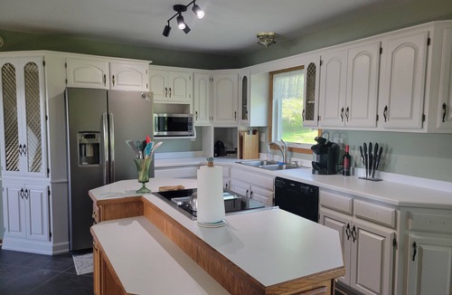 Hancock House | Spacious, pet-friendly home in Hancock Twp. Includes indoor sauna!