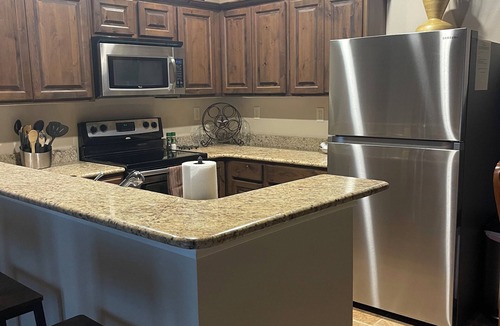 Gruene Condo | State Haus in Gruene on the river walk to tube, shop and dine! Village at Gruene