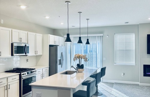 Maple Grove House | The Happy Hideaway suitable for mid-term rental, remote workers, & extended stay