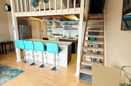 Village of Four Seasons Condo | The Little Penthouse is a charming two-level condo located in the gated Southwood Shores. This comfortable retreat offers access to resort style amenities including indoor and outdoor pools, a hot tub, playground, swimming area.
