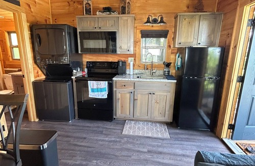 Newport Cabin | Tiny cabin with river and mountain views in Newport TN.
