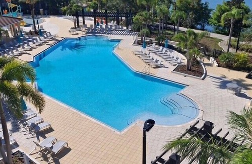 Florida Central Atlantic Coast Condo | Vista Cay Lakeview Joy. Next to Pool, Walk to Epic Universe and the OCCC
