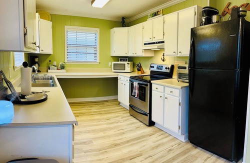North Myrtle Beach House | Waterfront Beach House on the Canal with Deep Water Access to Ocean w/Boat Ramp.