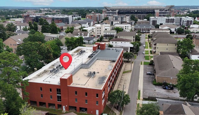 3-bedroom 3.5 bath condo! Gated Parking, Roof Deck, Steps to Stadium & Strip!