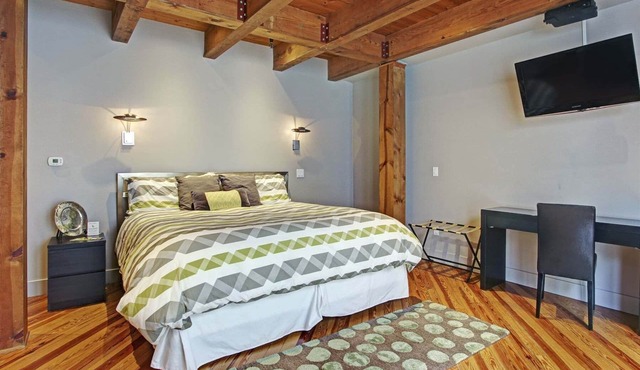 Experience luxury in the Torino Suite, a cozy 1-bedroom escape in charming Saugatuck.
