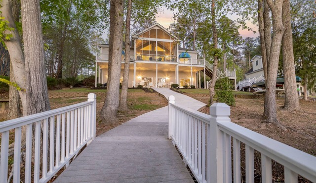 Lake Gaston waterfront home! Our guests love using our free pontoon boat !
