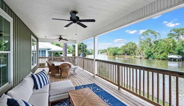 Perfect for families celebrating July 4th! Have a great time on the River with big porch and pier on the water!