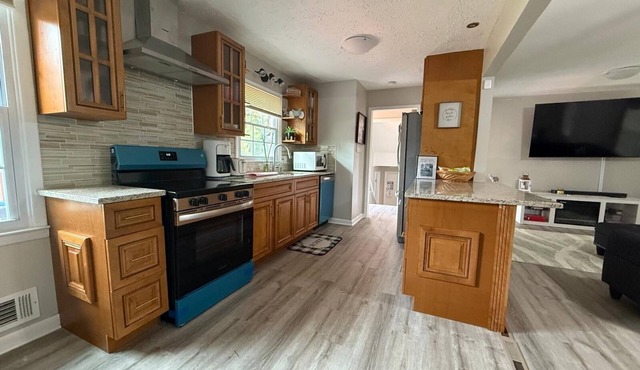 Spacious Riverdale Home with Game Room & Huge Backyard Deck, Close to Airport