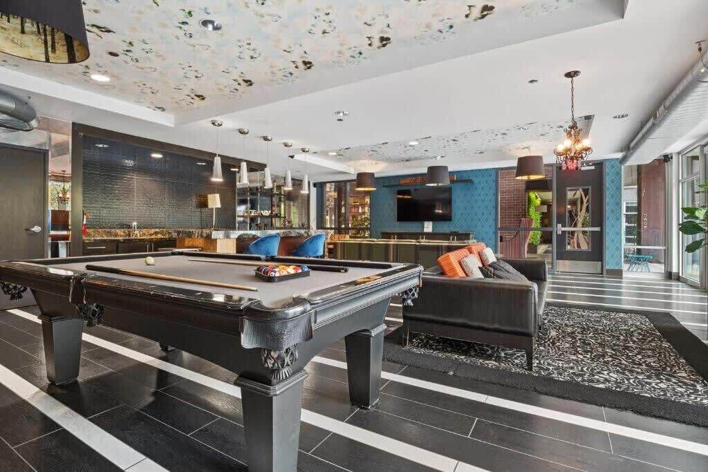 Mill District Apartment | CozySuites Mill District with pool, gym #12